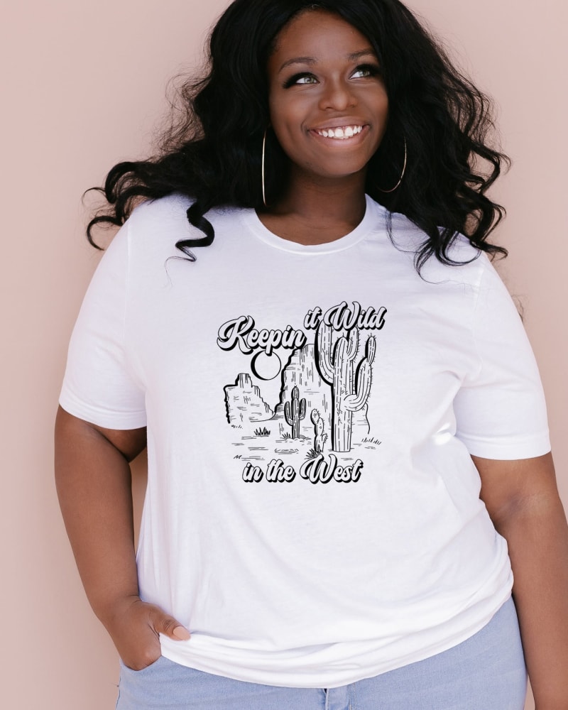 Front of a model wearing a size Large Keepin It Wild In The West in White by Simply Sage Market. | dia_product_style_image_id:281699